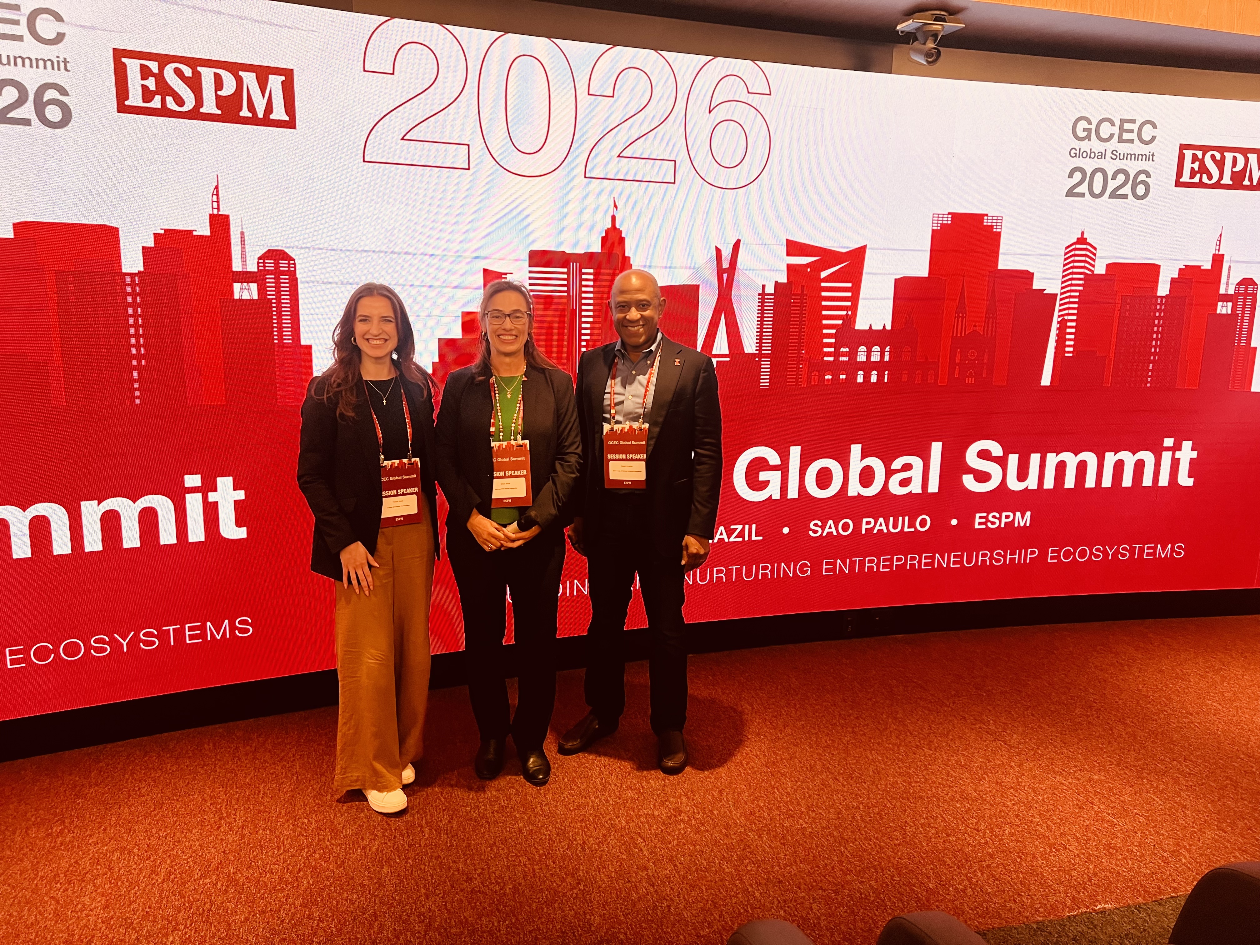 Farah Wells, Erica Berte, and David Charles pose for a group photo at the GCEC Global Summit.