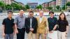 Dr. Mazhar Islam and Dr. Bobby Savoie pose with faculty and university leaders during their visit to Guangzhou Xinhua University in China.